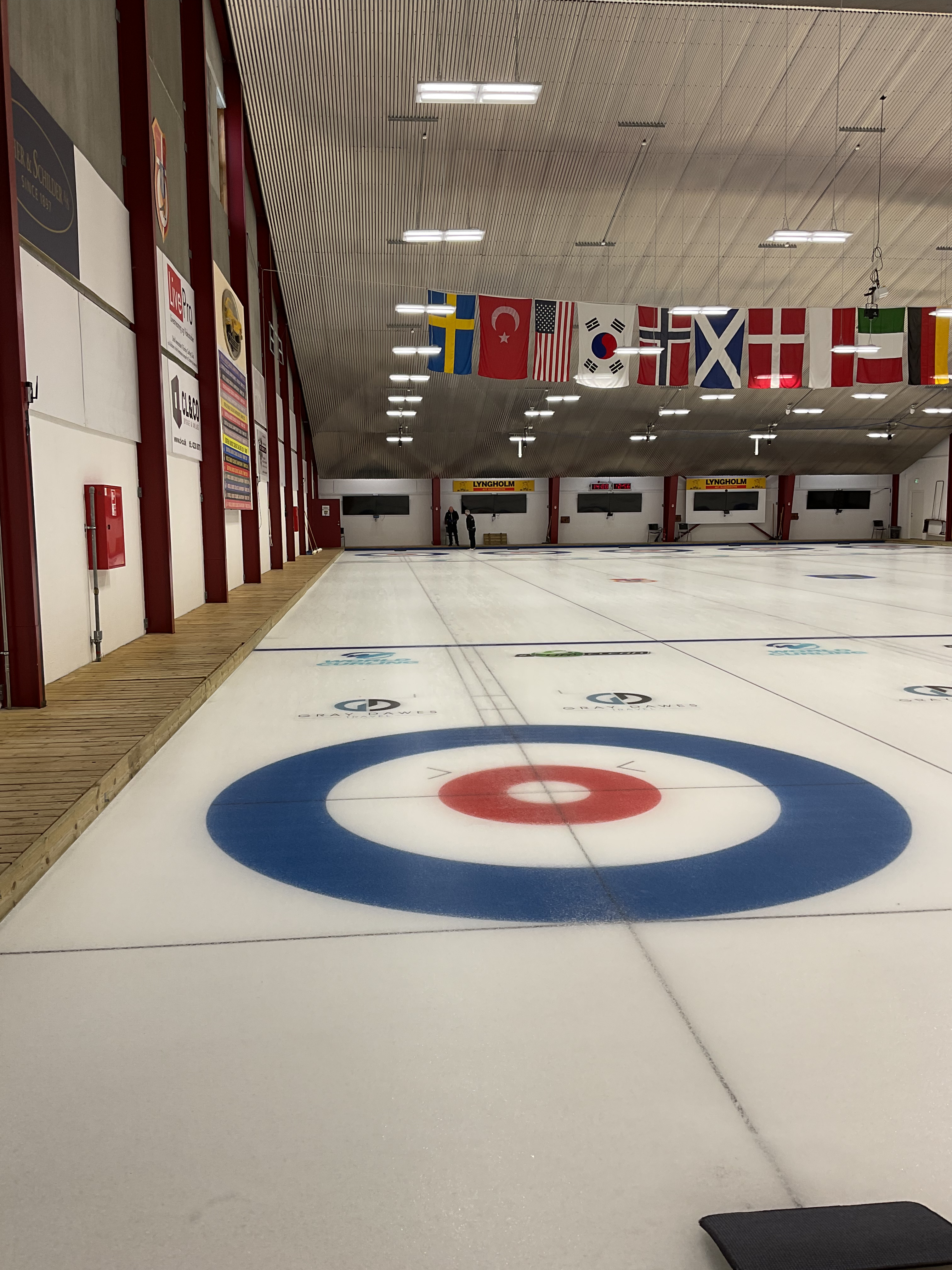 Finished Curling rinks, teqplan wear layer, grinding, polishing and line making