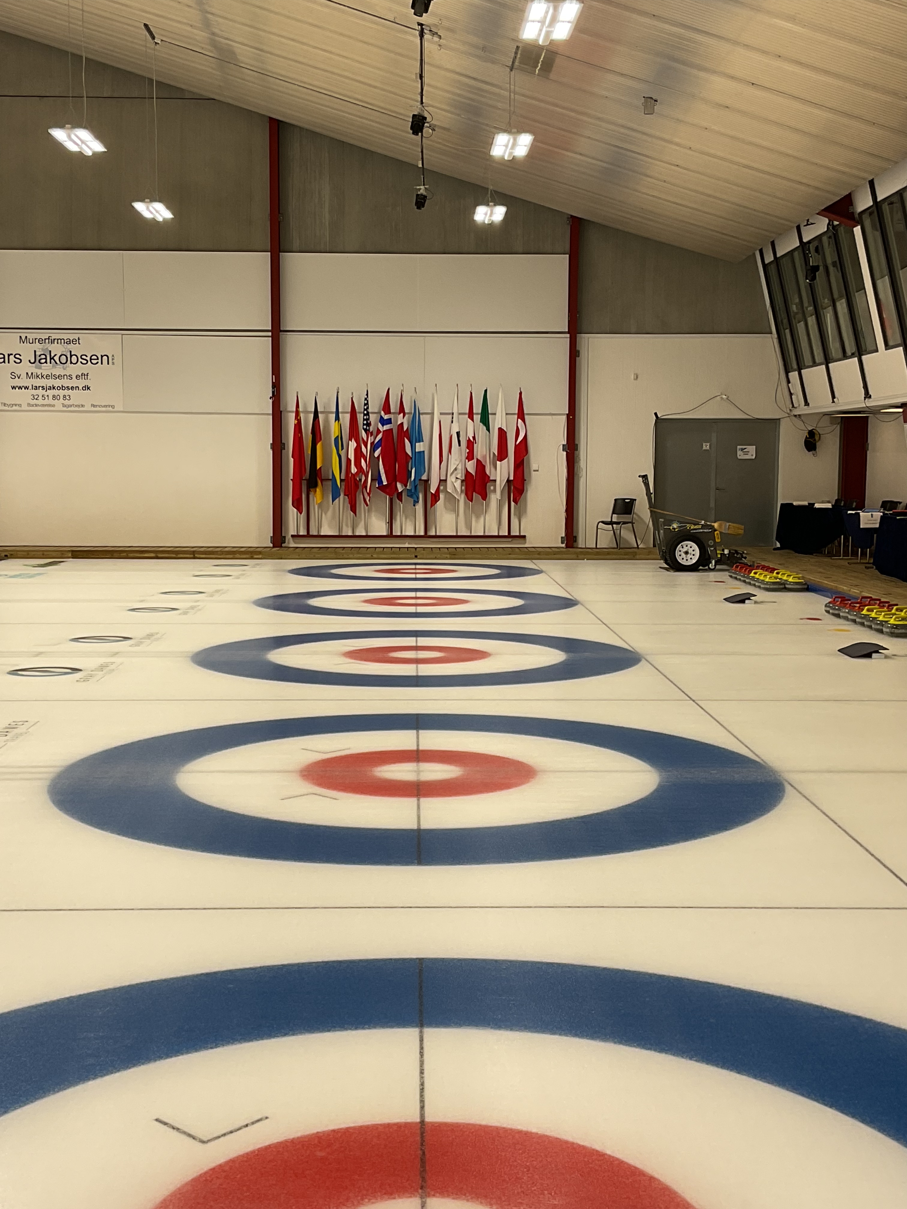 Finished Curling rinks, teqplan wear layer, grinding, polishing and line making