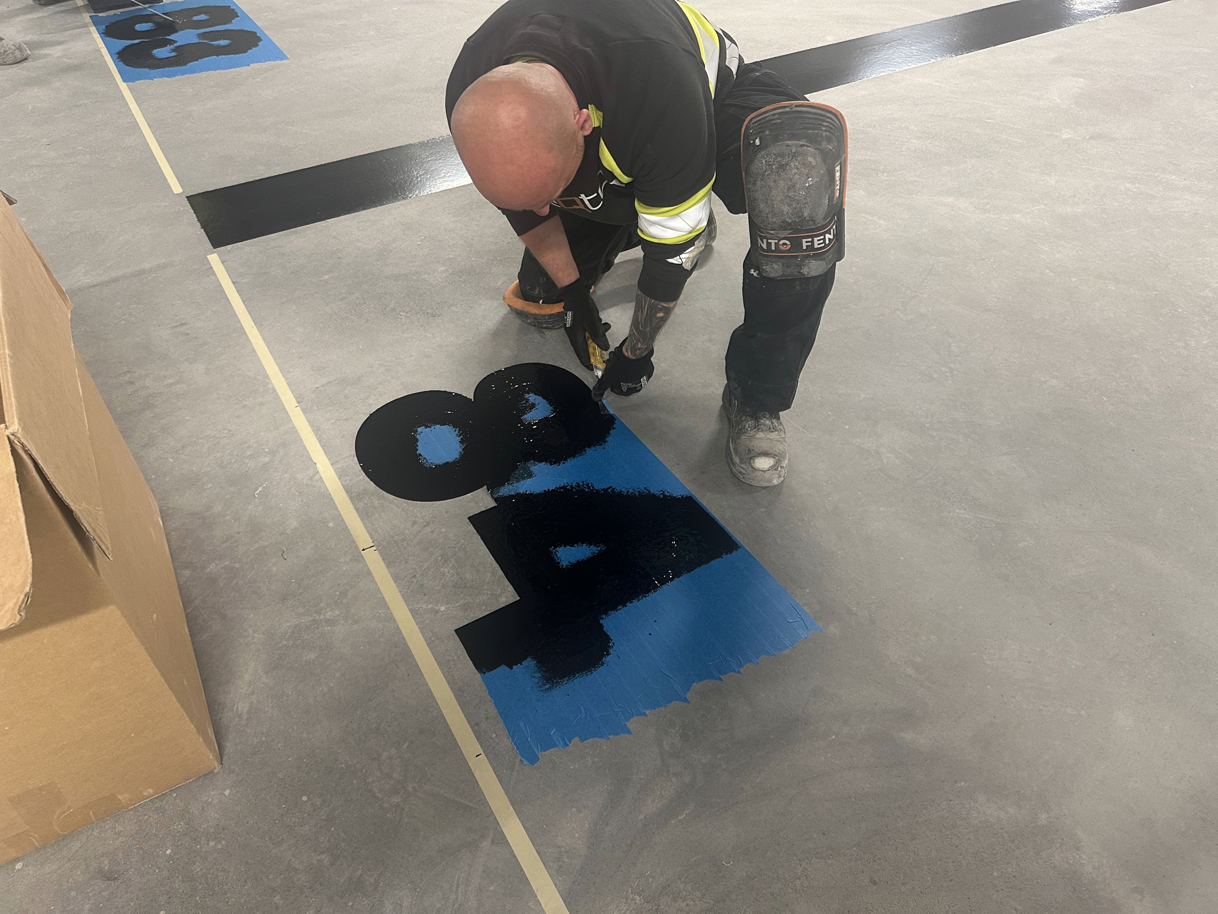 both conrete at line making done by Teqton. concrete and epoxy. high wear resistant polymer top layer.