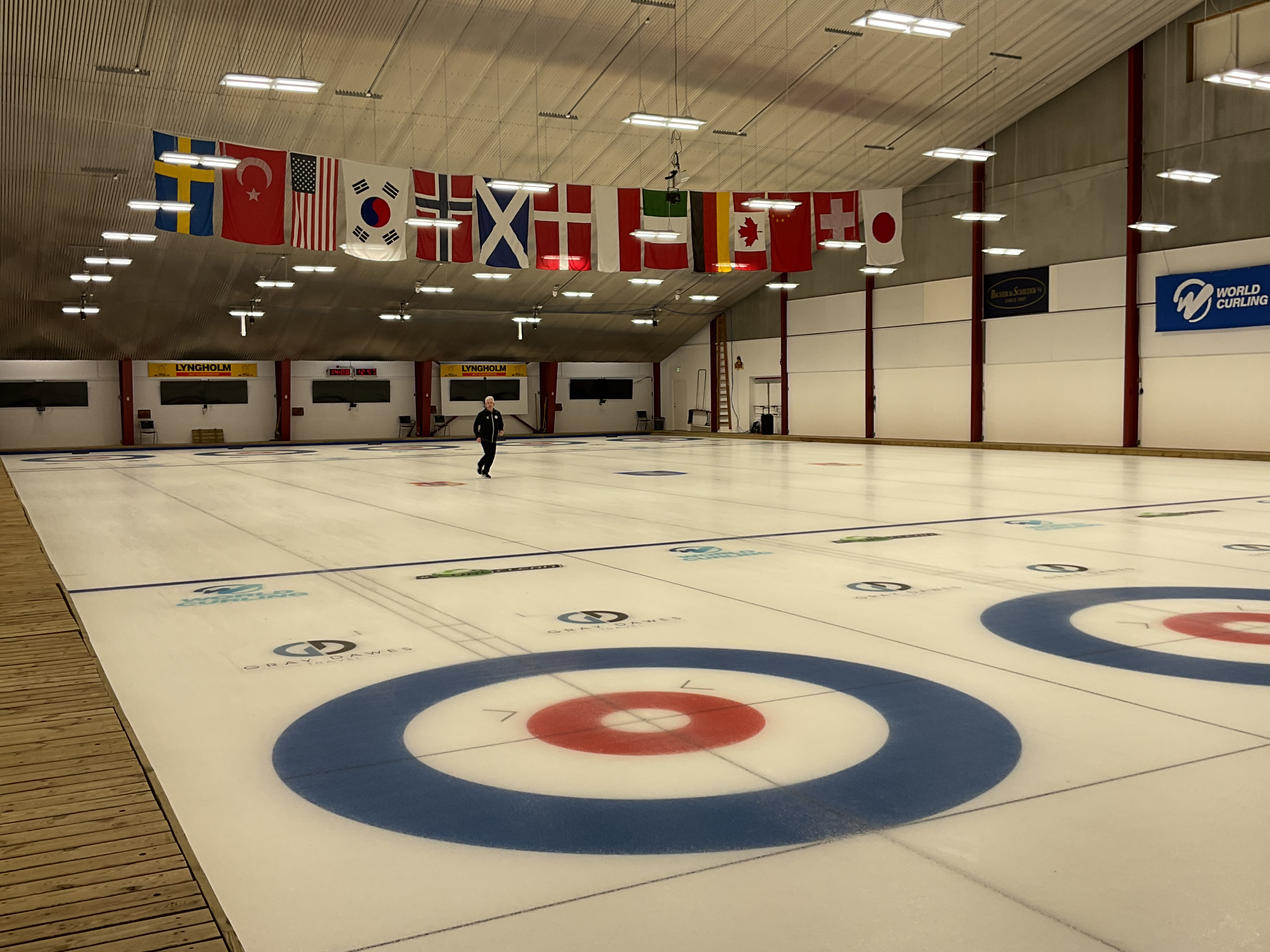 Finished Curling rinks, teqplan wear layer, grinding, polishing and line making